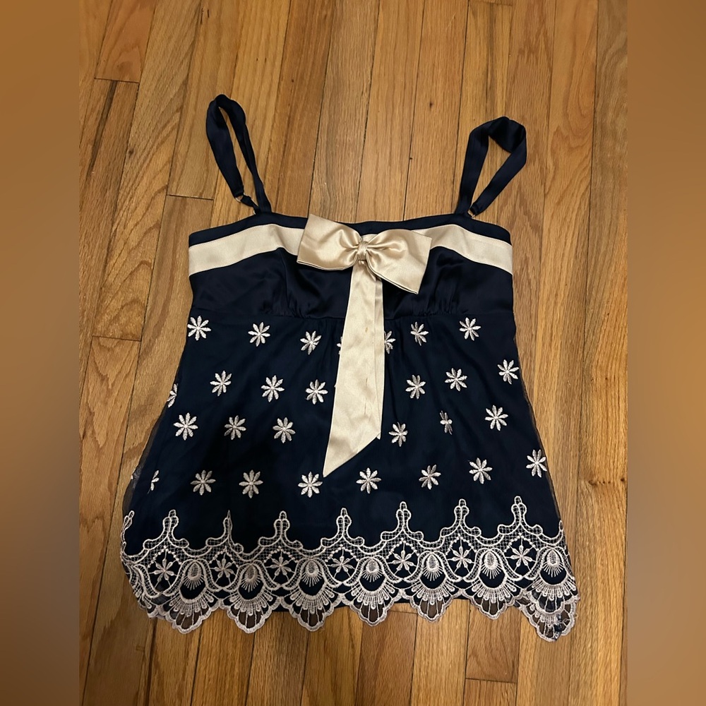 Bebe Navy Blue lace and satin bow blouse size M gently worn
